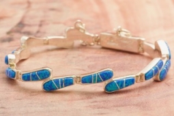 Calvinn Begay Fire and Ice Opal Sterling Silver Bracelet